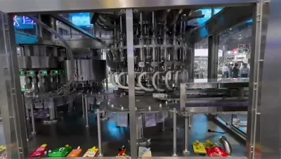 24-головочная машина для розлива и укупорки пакетов с носиком
